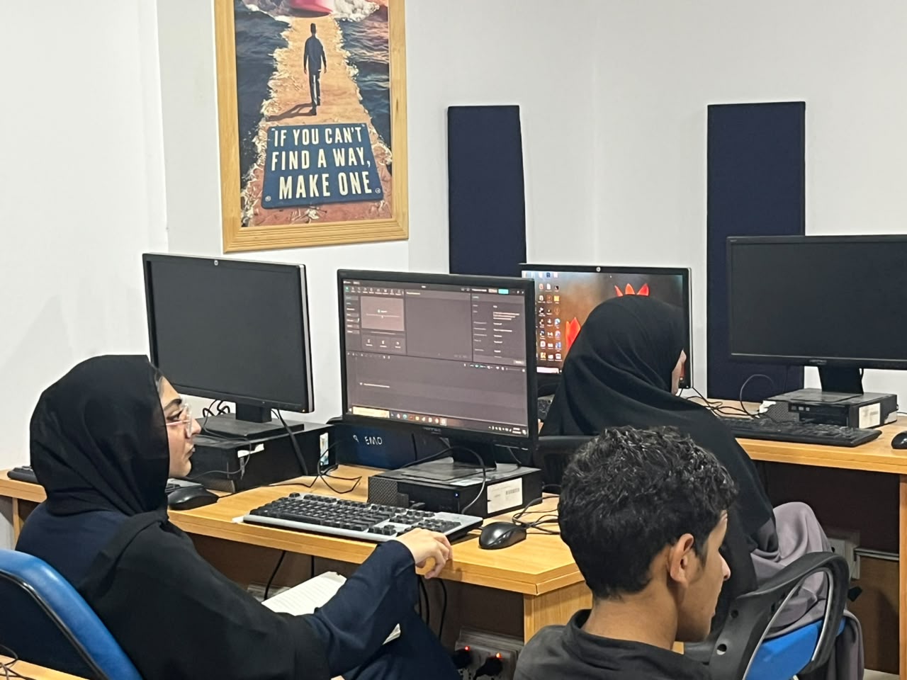 Learners practising at computers in an AI Sanctuary class