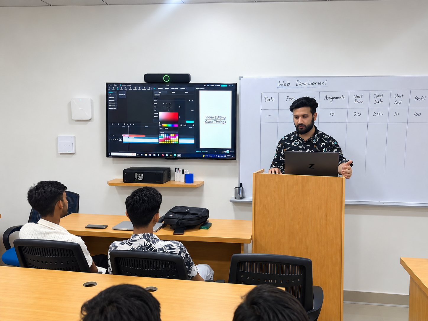 A mentor teaching learners at the AI Sanctuary centre