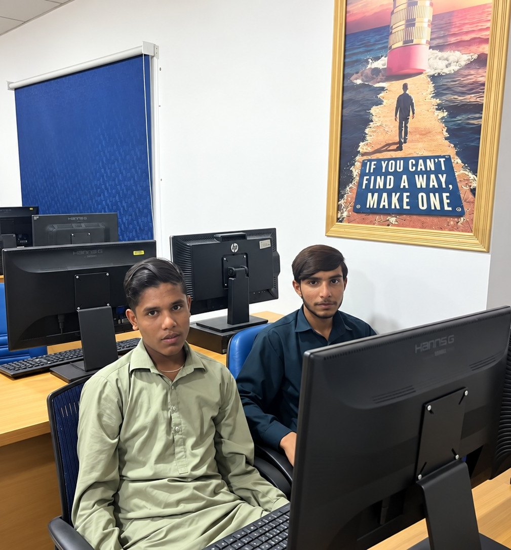 Two learners at their workstations