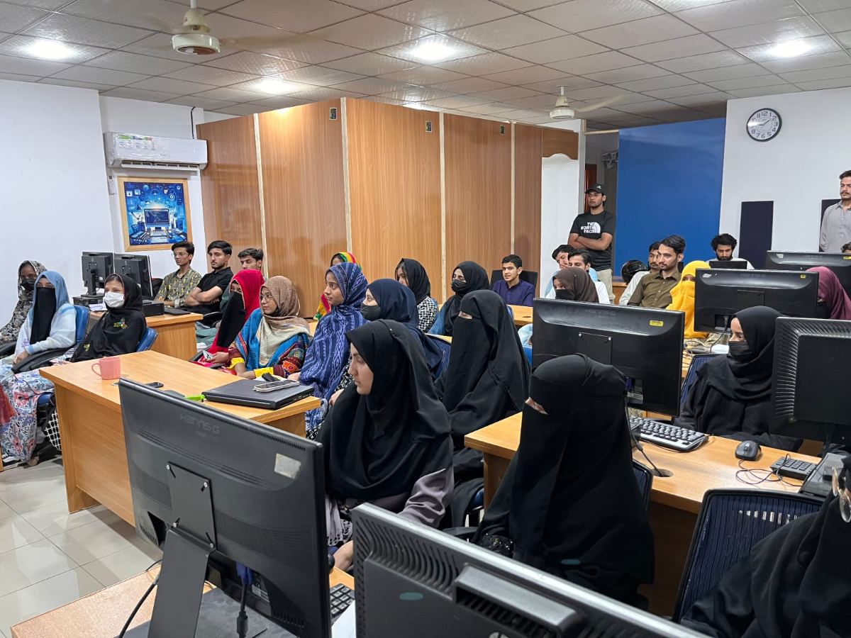 A full AI Sanctuary class of learners at their workstations